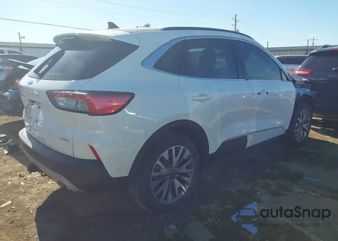 2021 Ford Escape Titanium z USA, uszkodzony, nr VIN 1FMCU9J90MUA30628